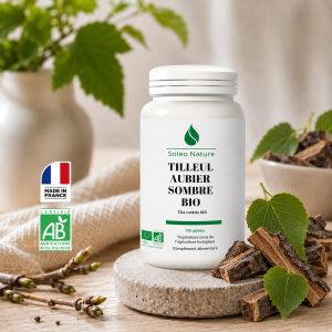 Pilulier blanc de 100 gélules d'aubier de tilleul sombre bio Soléo Nature, posé sur un galet de pierre claire